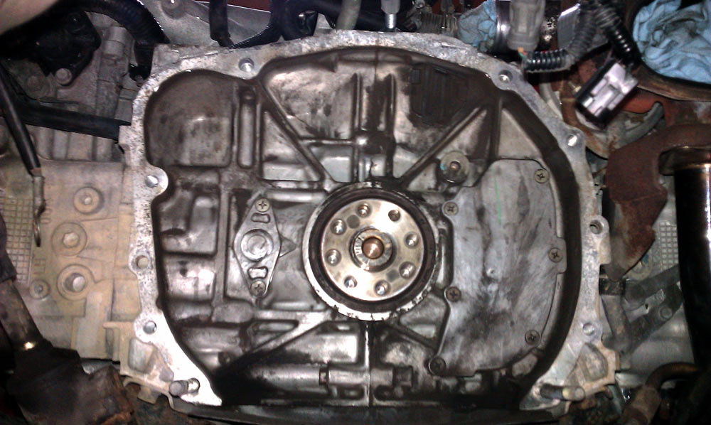 Engine behind Flywheel